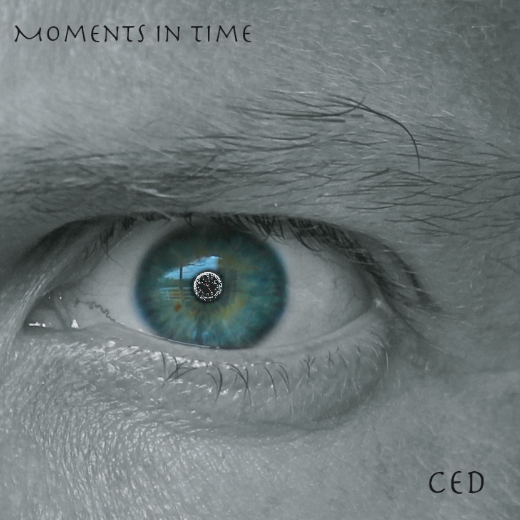 Album cover with eye writing Moment in time
