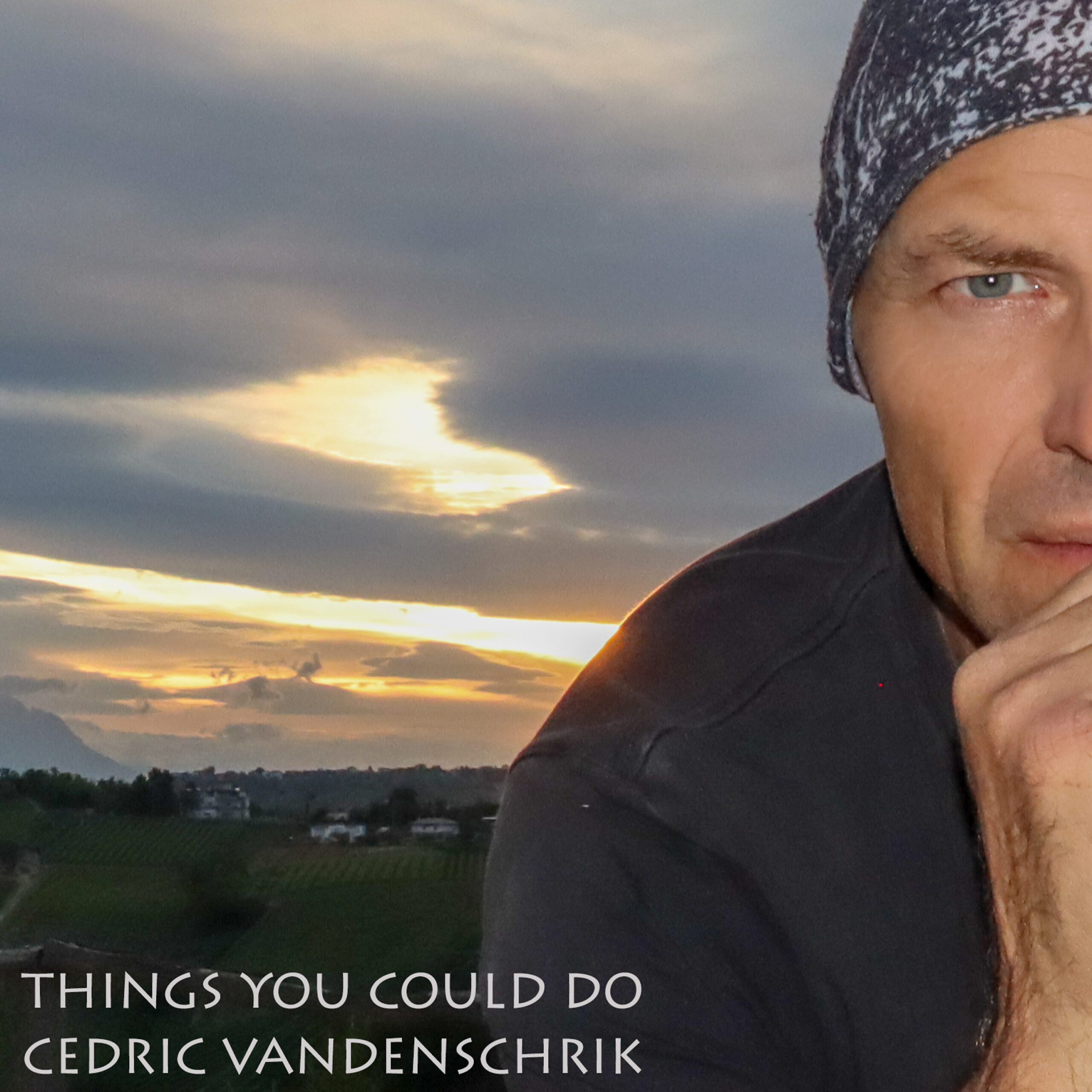 Cover for song release with Cedric Vandenschrik in fore ground and sunset in the background and writing in bottom left corner: Things you could do Cedric Vandenschrik